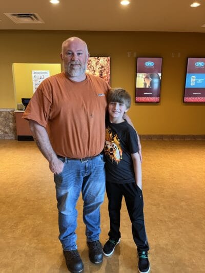 dad and his son hugging each other
