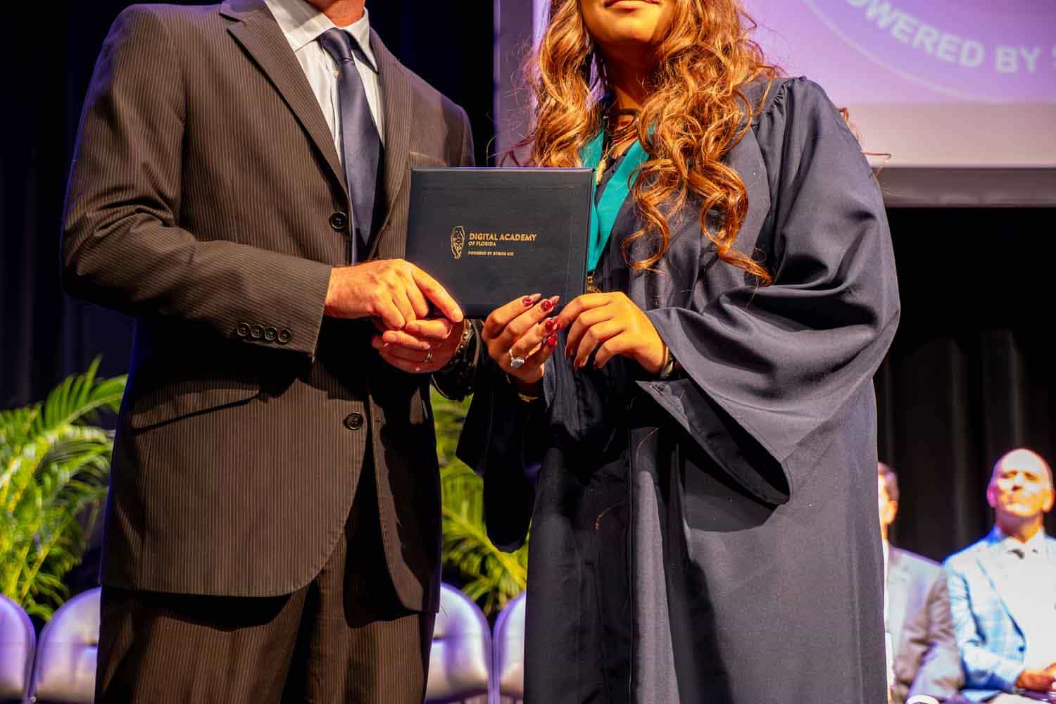 girl receiving the diploma