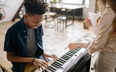 Student playing the piano