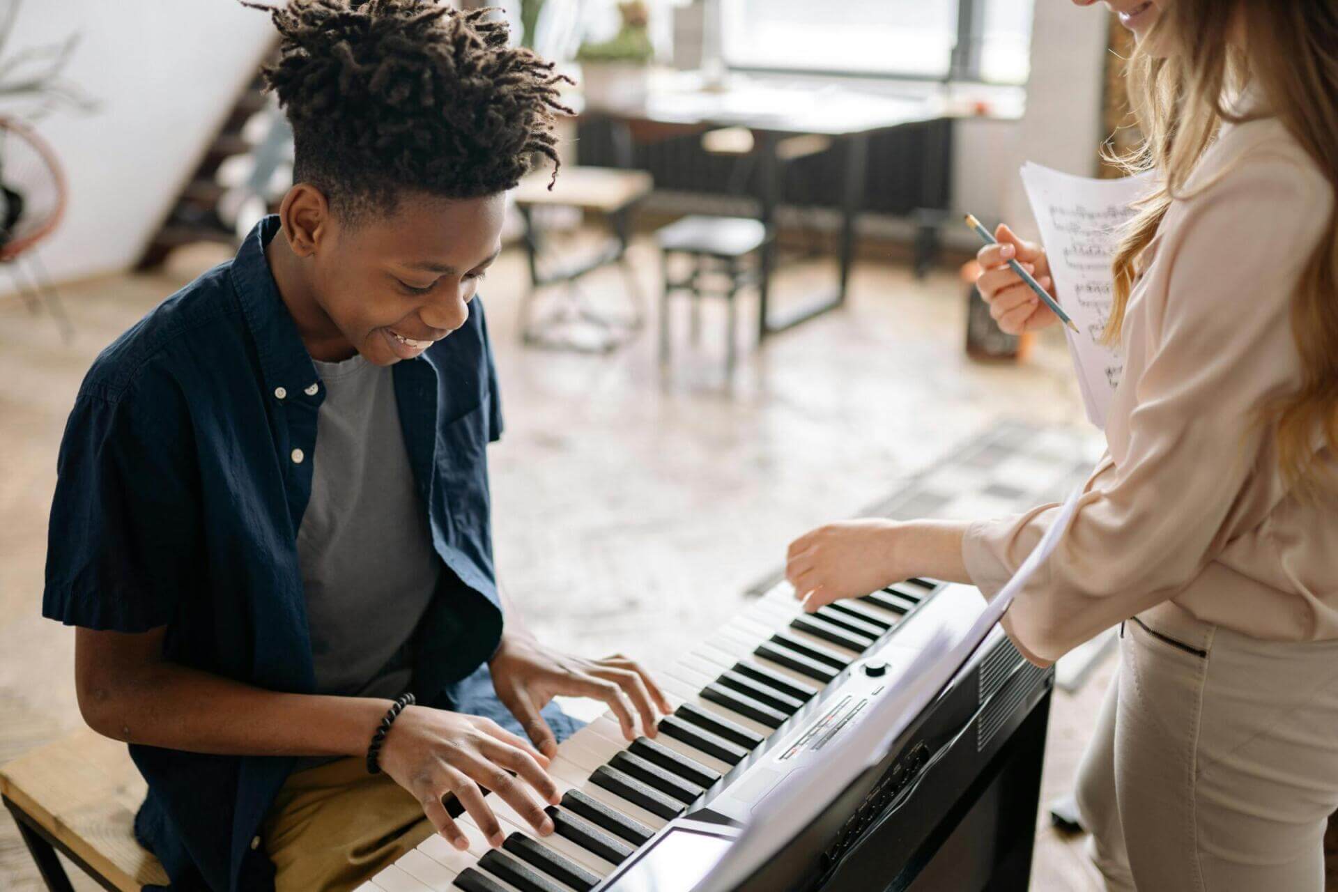 Student playing the piano