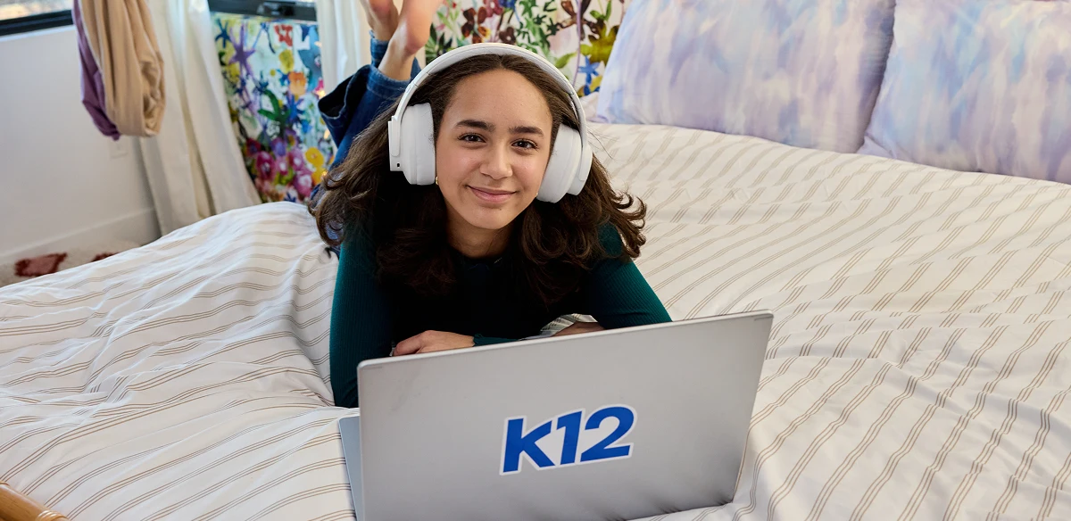 girl smiling and using headphones