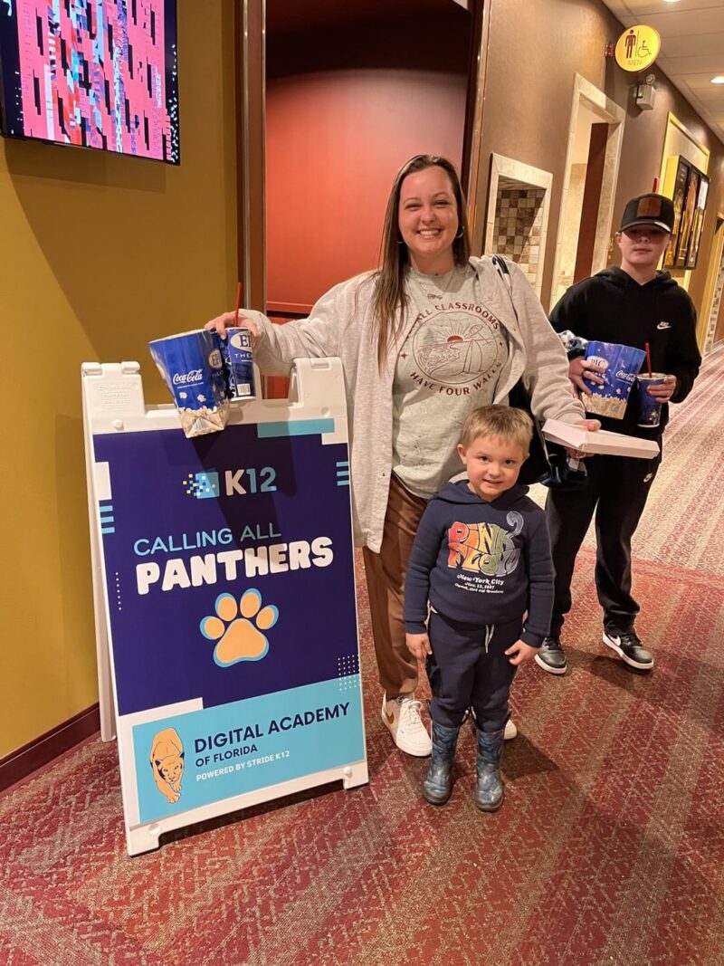 people smiling at the cinema